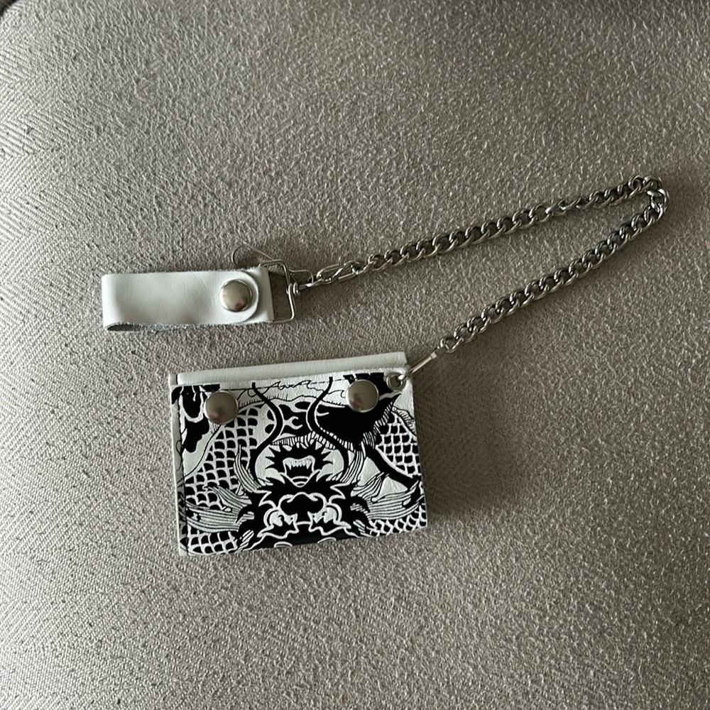 Small Black cross body bag H&M and a white chain wallet Frankenstein&Minx